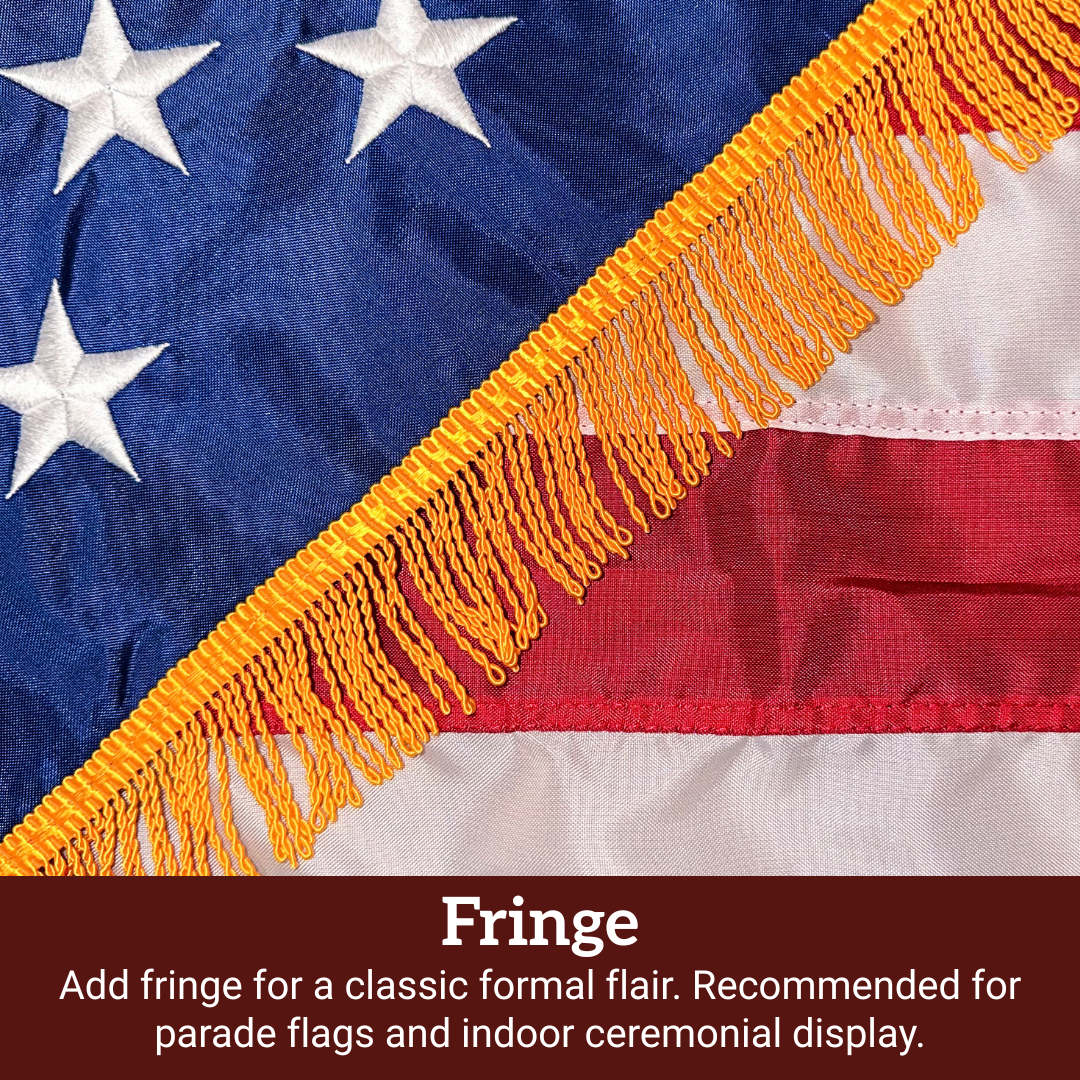 American flag with gold fringe designed for ceremonial and indoor display